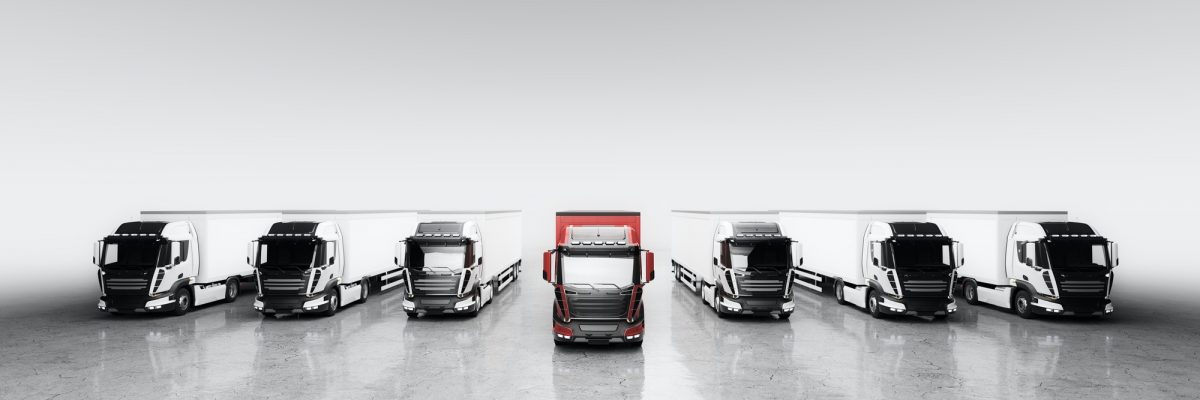 Fleet of trucks with cargo trailers. Transport, shipping industry.